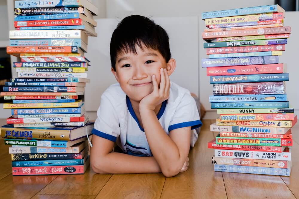 Child with books.