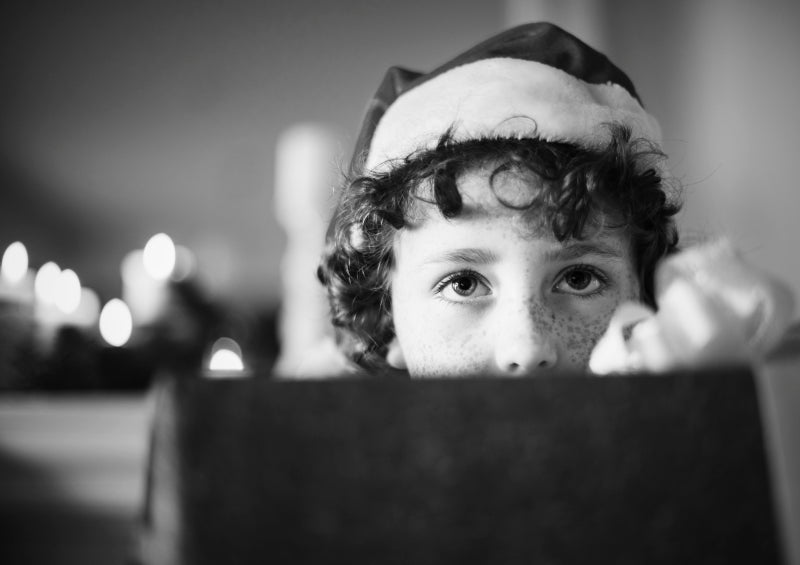 Child in a Santa hat