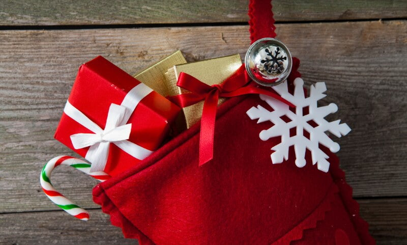 Wrapped christmas gifts in a stocking