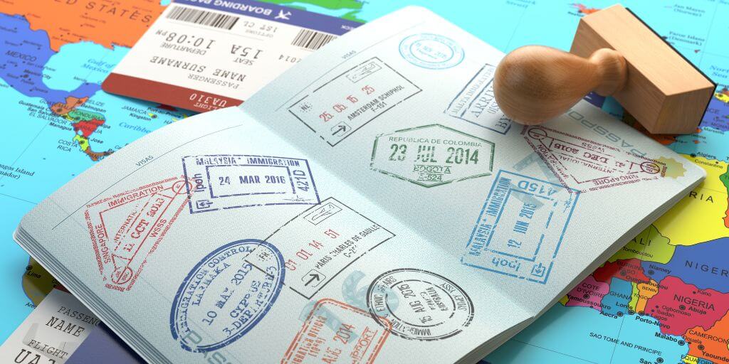 Map, passport and lots of travel stamps