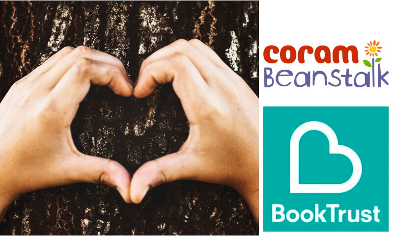 Hands making a heart to show support for Coram Beanstalk and Book Trust, two UK literacy charities this Christmas