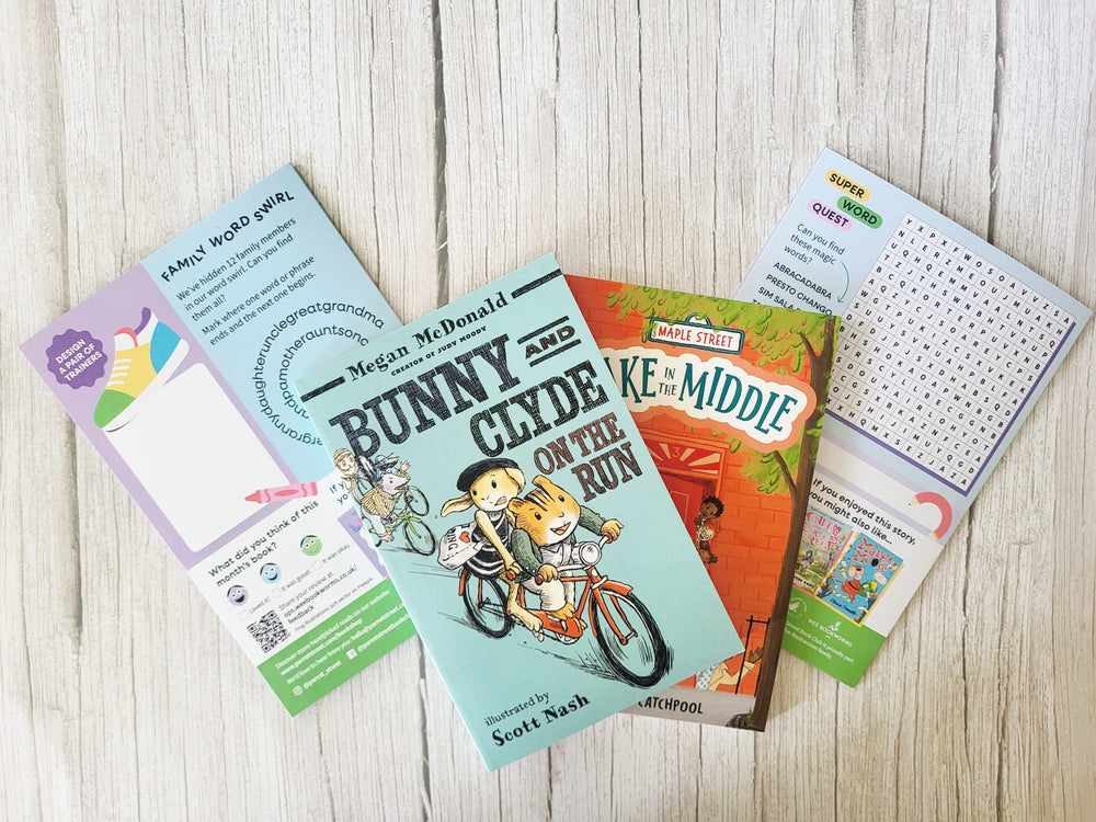 Children's books and educational materials on a wooden surface