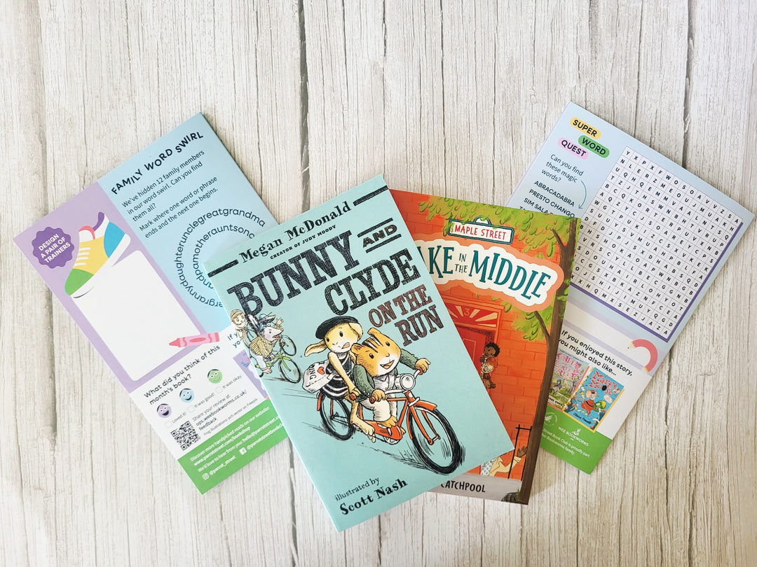 Children's books and educational materials on a wooden surface