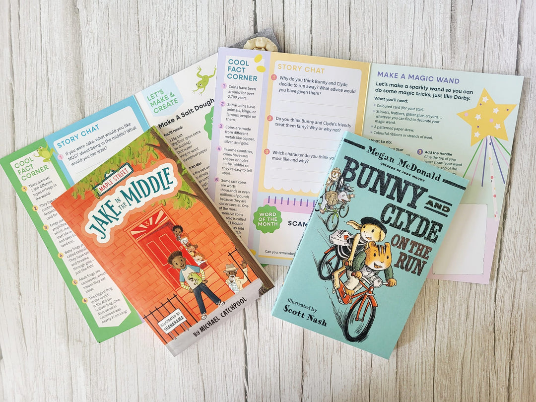 Children's books on a wooden surface