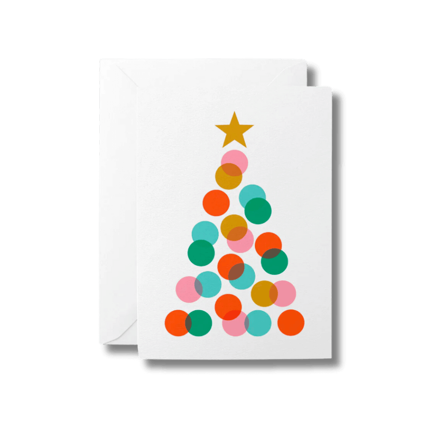 Bold and colourful Christmas tree design on a greetings card with a white envelope.