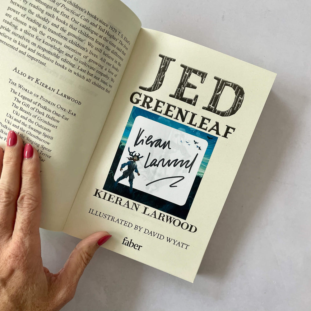 Open book with 'Jed Greenleaf' and 'Kieran Larwood' plus a signed bookplate on a light background