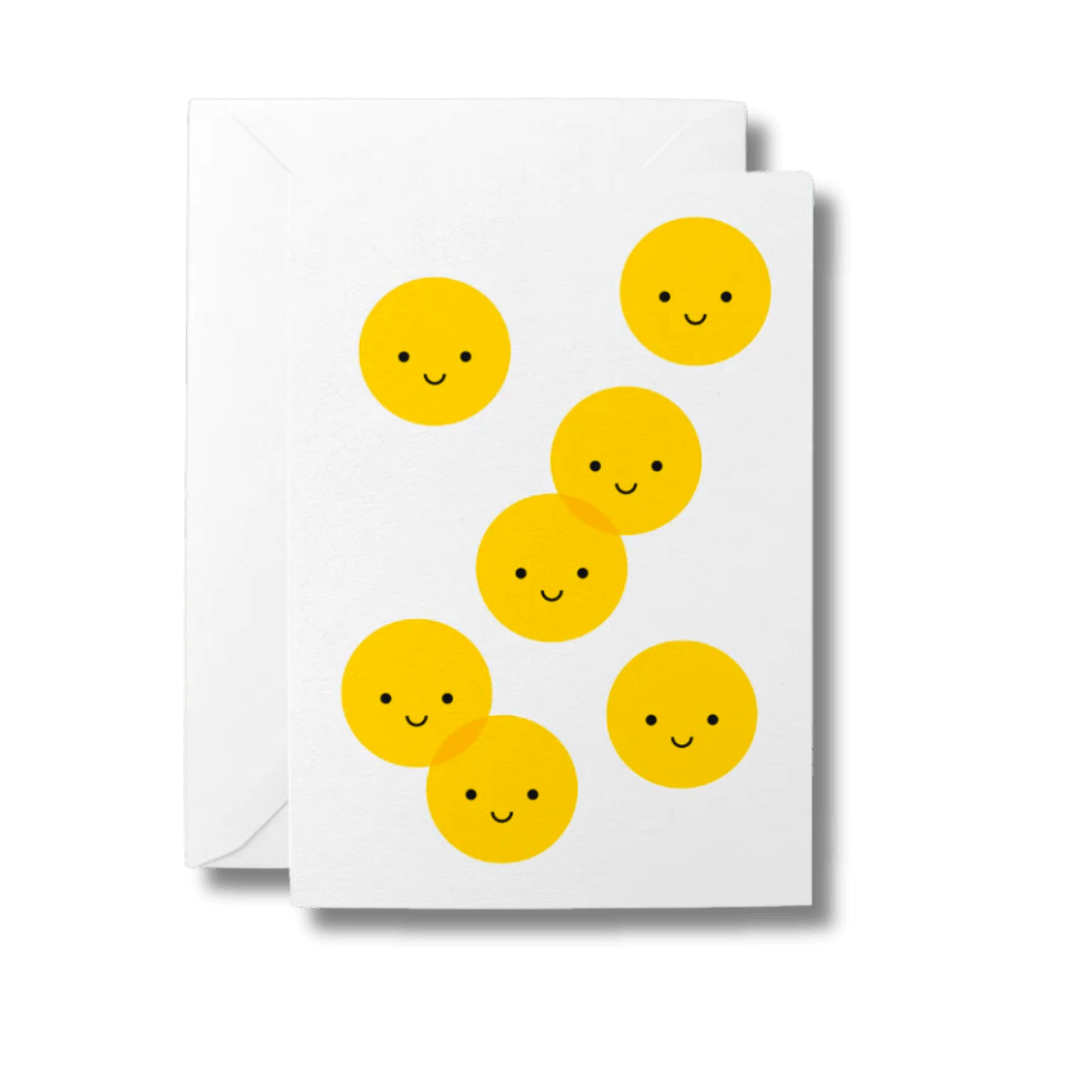 Greeting card with lots of yellow smiley faces on it