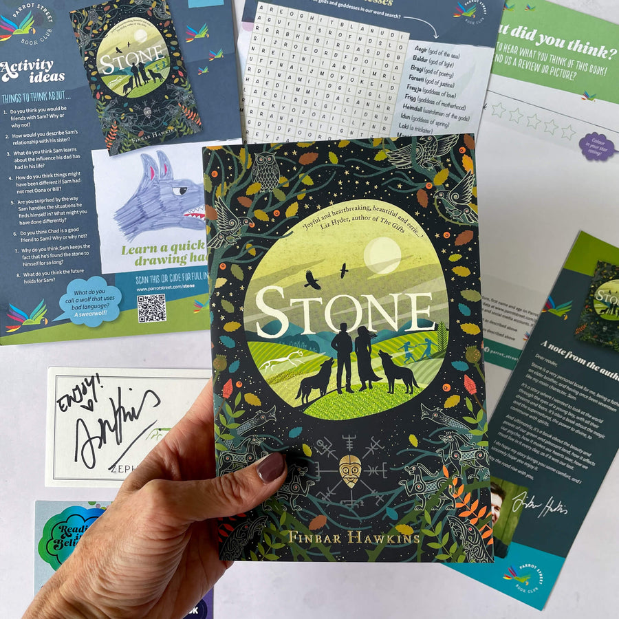Stone by Finbar Hawkins surrounded by an activity pack, stickers and bookplate signed by the author