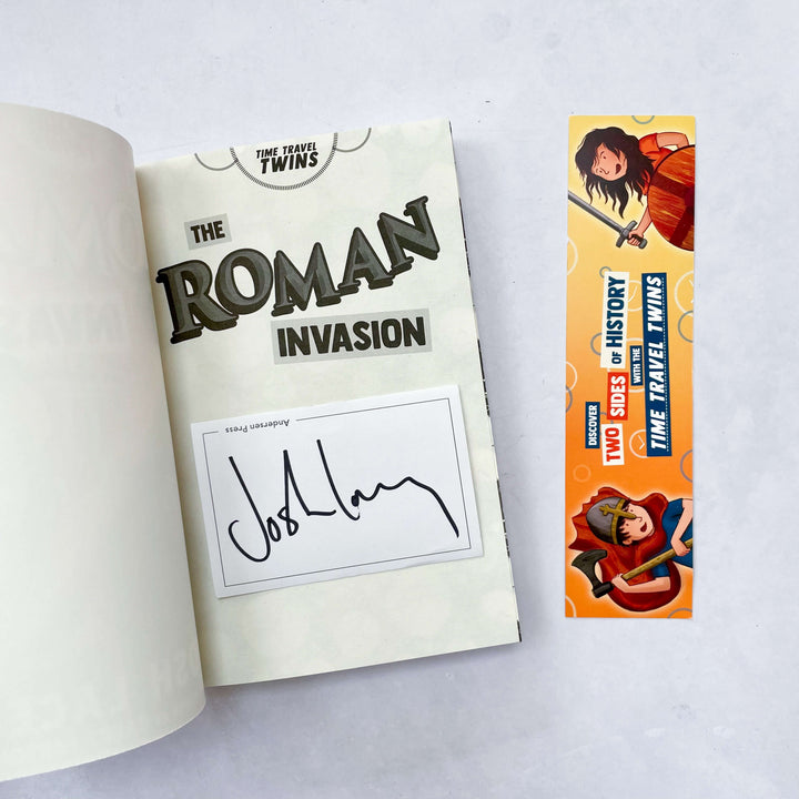 Bookplate signed by Josh Lacey (author) inside an open copy of Time Travel Twins: The Roman Invasion with bookmark next to it