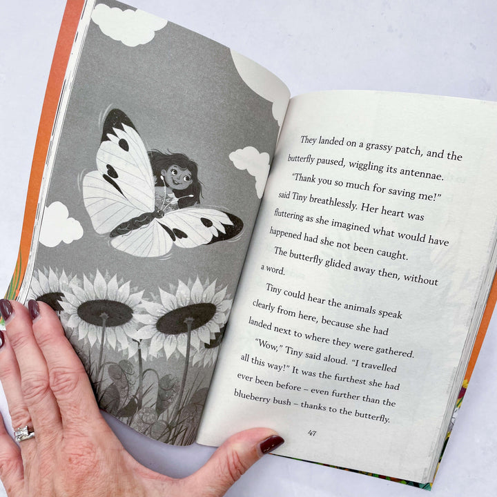 Open copy of Tiny the Secret Adventurer showing the text size and black & white illustrations