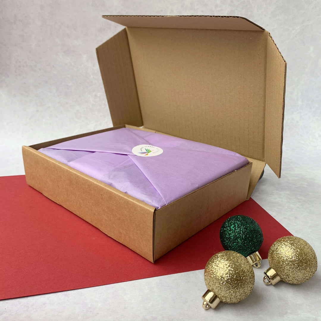 Book gift set for kids who love to read, wrapped in tissue and sent in a box.